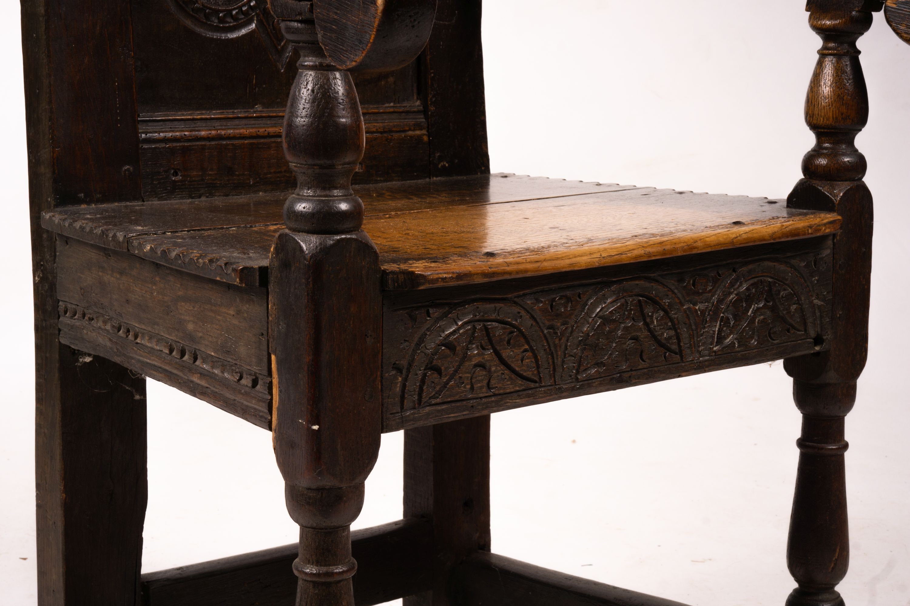 A 17th century style oak Wainscot chair, width 54cm, depth 52cm, height 104cm